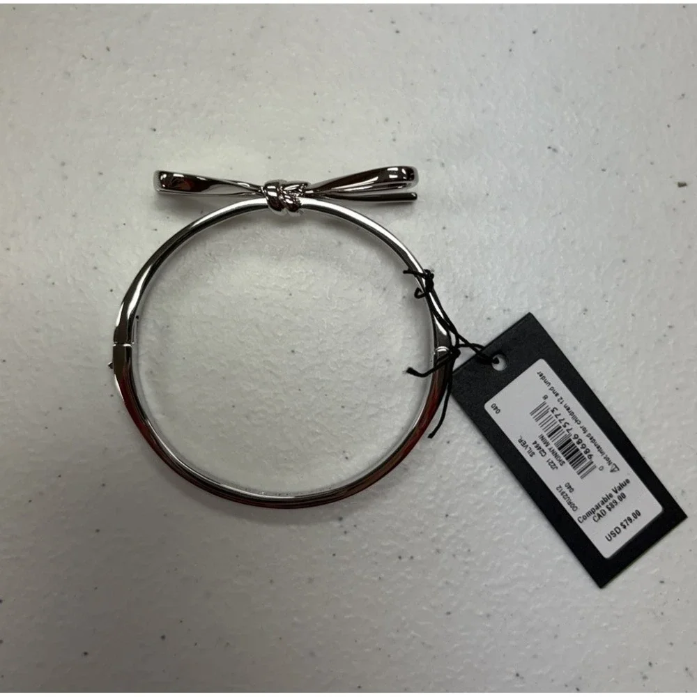 Kate Spade New York Skinny Mini Bow Silvertone Bow Bangle - NEW w/o Dustbag - Picture 2 of 2